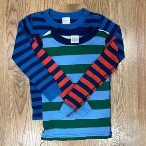 Two Hanna Andersson pajama tops size 110